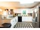 Modern kitchen features stainless steel appliances, granite countertops and white cabinets at 361 N Dogwood N Ave, Social Circle, GA 30025