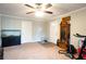 Spacious living room featuring neutral walls, carpet floors, and two entrances at 361 N Dogwood N Ave, Social Circle, GA 30025