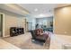 Finished basement with workout equipment and sitting area at 3641 Mountain Cove Rd, Snellville, GA 30039