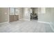 Spacious basement area with tile flooring, a treadmill and windows at 3641 Mountain Cove Rd, Snellville, GA 30039