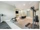 Basement gym area with workout equipment and ample space for exercise at 3641 Mountain Cove Rd, Snellville, GA 30039