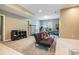Finished basement features a futon and gym equipment, offering a versatile space at 3641 Mountain Cove Rd, Snellville, GA 30039