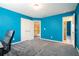 Bedroom featuring blue walls and a carpet floor at 3641 Mountain Cove Rd, Snellville, GA 30039