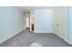 Bedroom with a view to an en-suite bathroom and walk-in closet at 3641 Mountain Cove Rd, Snellville, GA 30039
