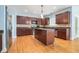 Well-equipped kitchen with wood cabinets, stainless steel appliances, and center island at 3641 Mountain Cove Rd, Snellville, GA 30039
