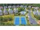 Aerial view showcases the community's pool, tennis courts, and well-maintained landscaping at 4251 Haywater Cv, Buford, GA 30519