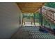 Outdoor patio area with a swing and fire pit, perfect for relaxation and entertaining at 590 Kyle Trace Ct, Sugar Hill, GA 30518
