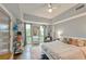 Bright, airy bedroom with large windows providing city views, hardwood floors, and ample space at 1100 Howell Mill Nw Rd # 312, Atlanta, GA 30318