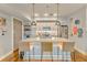 Modern kitchen with stainless steel appliances and an island with bar stool seating at 1100 Howell Mill Nw Rd # 312, Atlanta, GA 30318