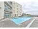 Rooftop pool with lounge seating, overlooks the city, and offers a relaxing amenity for residents at 1100 Howell Mill Nw Rd # 312, Atlanta, GA 30318