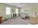 Bright, charming bedroom features plush carpet, ample light, and delightful decor at 1404 Vernon North Dr, Dunwoody, GA 30338