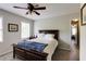 Comfortable bedroom with neutral colors, a ceiling fan, and a cozy bed at 1404 Vernon North Dr, Dunwoody, GA 30338