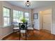 Breakfast nook featuring hardwood flooring and beautiful window views at 1404 Vernon North Dr, Dunwoody, GA 30338