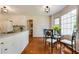 Kitchen featuring stainless steel appliances and hardwood flooring with a breakfast nook at 1404 Vernon North Dr, Dunwoody, GA 30338
