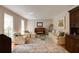 Cozy living room featuring elegant furnishings, hardwood floors, and natural light at 1404 Vernon North Dr, Dunwoody, GA 30338