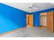 Bedroom featuring a closet, wood trim, and neutral carpet at 239 Berry Rd, Mcdonough, GA 30252