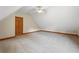 Large finished bonus room with natural lighting from a large window at 239 Berry Rd, Mcdonough, GA 30252