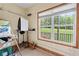 Bright bonus room featuring natural light and backyard views, offering potential for a home office or storage at 239 Berry Rd, Mcdonough, GA 30252