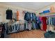 Walk in closet featuring plenty of space for clothing, shoes and accessories at 239 Berry Rd, Mcdonough, GA 30252