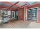 Spacious covered back deck with room to relax and entertain next to the house at 239 Berry Rd, Mcdonough, GA 30252