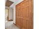 Hallway featuring wood doors and trim leading to the bathroom at 239 Berry Rd, Mcdonough, GA 30252