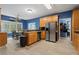 Kitchen with stainless steel appliances, bar seating, and dining area at 239 Berry Rd, Mcdonough, GA 30252