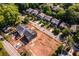 Aerial view of new construction homes in a neighborhood near tree-lined streets at 278 1St Ave, Avondale Estates, GA 30002