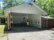 Two car carport and garage for vehicles and storage at 2934 Union Grove Rd, Conyers, GA 30012