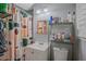 Bathroom with shelving and a shower at 648 Cativo Sw Dr, Atlanta, GA 30311