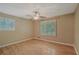 Bright bedroom featuring wood floors and a ceiling fan at 648 Cativo Sw Dr, Atlanta, GA 30311