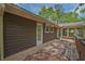 Inviting backyard deck offers a seamless transition to the sunroom with large windows at 648 Cativo Sw Dr, Atlanta, GA 30311