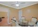 Bright dining area with a glass table, and hardwood style tile flooring at 648 Cativo Sw Dr, Atlanta, GA 30311
