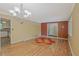 Open floor plan showcasing hardwood floors and ample natural light in the dining room at 648 Cativo Sw Dr, Atlanta, GA 30311