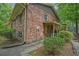 Charming brick home with lush landscaping and a cozy covered entrance offers curb appeal at 648 Cativo Sw Dr, Atlanta, GA 30311