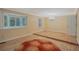 Open living room with hardwood floors, natural lighting, and architectural details at 648 Cativo Sw Dr, Atlanta, GA 30311