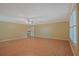 Open living room with lots of natural light and hardwood style tile flooring at 648 Cativo Sw Dr, Atlanta, GA 30311