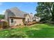Spacious backyard with grass and deck, ideal for outdoor activities and entertaining at 1377 Downington Nw Ln, Acworth, GA 30101