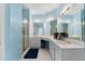 Bright bathroom with dual sinks, vanity, shower, and bathtub with gold hardware at 1377 Downington Nw Ln, Acworth, GA 30101