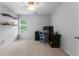 Bedroom featuring neutral walls, and shelving, well-lit by a bright window at 1377 Downington Nw Ln, Acworth, GA 30101