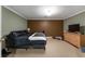 Spacious bedroom features neutral paint, carpet flooring, and ample natural light at 1377 Downington Nw Ln, Acworth, GA 30101