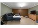 Bedroom featuring contrasting wall colors, ceiling light, and a queen size bed at 1377 Downington Nw Ln, Acworth, GA 30101