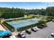 A community area with tennis courts, a playground, parking, and a grassy area at 1377 Downington Nw Ln, Acworth, GA 30101