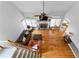 View of the living room with stone fireplace and hardwood floors at 1377 Downington Nw Ln, Acworth, GA 30101