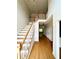Spacious foyer with a staircase and hardwood floors providing a grand entrance at 1750 Providence Place Dr, Alpharetta, GA 30009