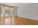 Sunlit room with hardwood floors and bay window at 1750 Providence Place Dr, Alpharetta, GA 30009