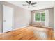Bright bedroom with hardwood floors, ceiling fan, and window views at 2714 Laurel Ridge Dr, Decatur, GA 30033