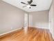 Bedroom with hardwood floors, a ceiling fan, and ample closet space at 2714 Laurel Ridge Dr, Decatur, GA 30033