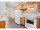 Bright kitchen with wooden cabinets, granite countertops, and modern appliances at 2714 Laurel Ridge Dr, Decatur, GA 30033