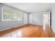 Light-filled living room with hardwood floors, large windows, and neutral paint at 2714 Laurel Ridge Dr, Decatur, GA 30033