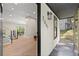 Open entryway leads to a living area with wood floors and abundant natural light at 5401 Martins Crossing Rd, Stone Mountain, GA 30088